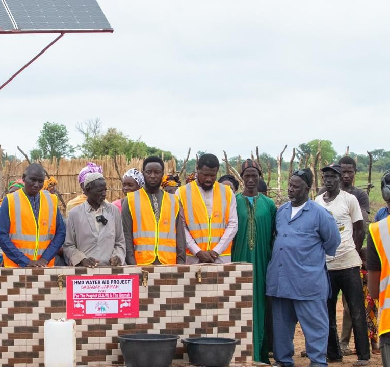 HMD field team at a community water point